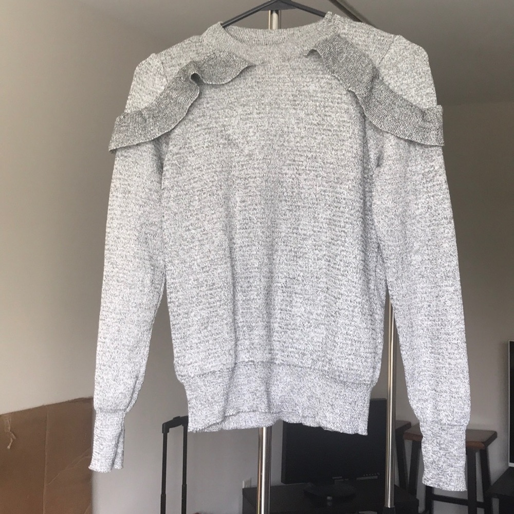 Beautiful warm sweater with ruffles